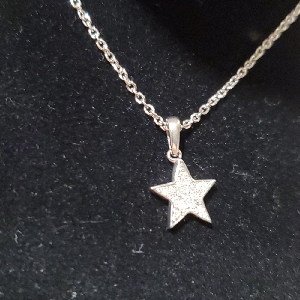 Rhodium plated sterling silver diamond star